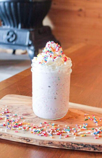 Funfetti Frappe: Celebrate our third birthday with our new Funfetti Frappe! It tastes like a vanilla milkshake, mixed and topped with sprinkles. This drink contains caffeine but is coffee-free, so feel free to add a shot of espresso for that coffee.